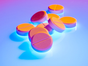 Pills-with-blue-background-300x225