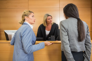 Lawyers speaking with judge