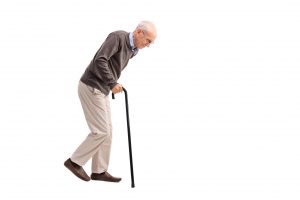 Old man walking with a cane