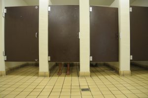 Restroom-stalls-with-feet-300x199